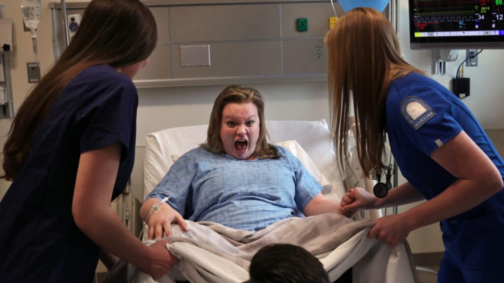 pregnant woman in labor screaming