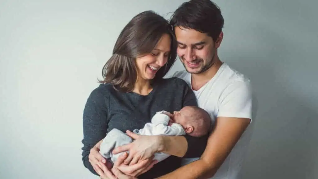 happy parents with baby