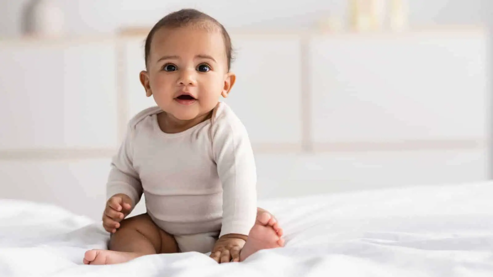 cute baby on bed