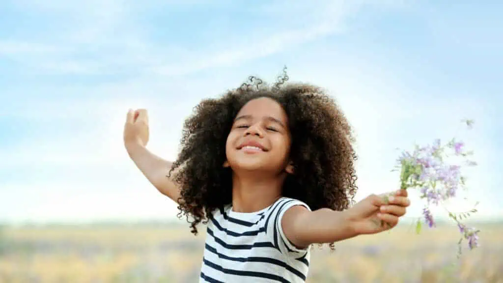 happy girl child outside nature