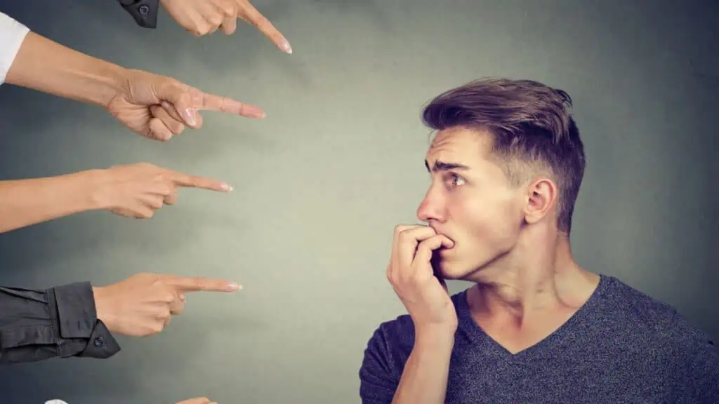 man feeling guilty fingers pointing nervous