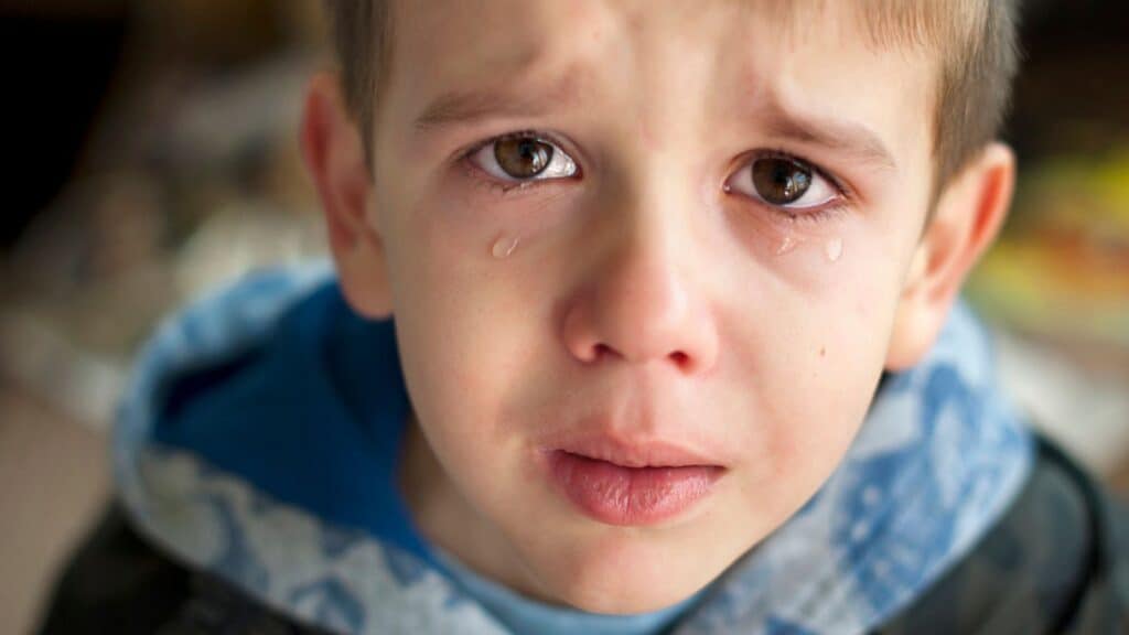 sad boy crying tears