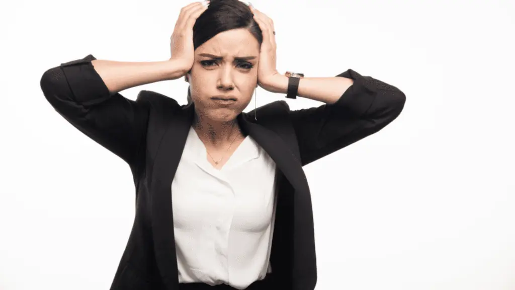 frustrated woman stop talking headache business casual