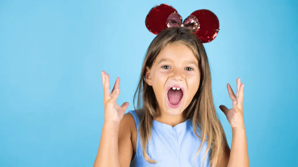 girl in mickey ears annoyed frustrated surprised