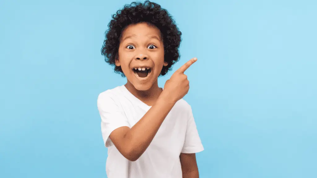 surprised boy happy losing teeth cute