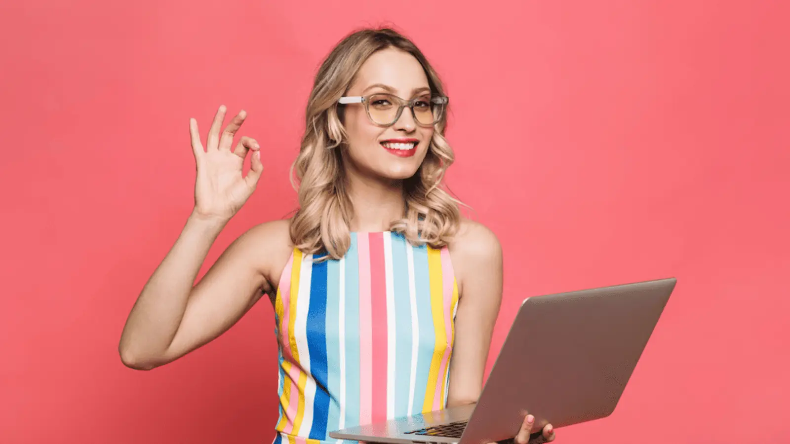 happy woman glasses computer rainbow dress okay