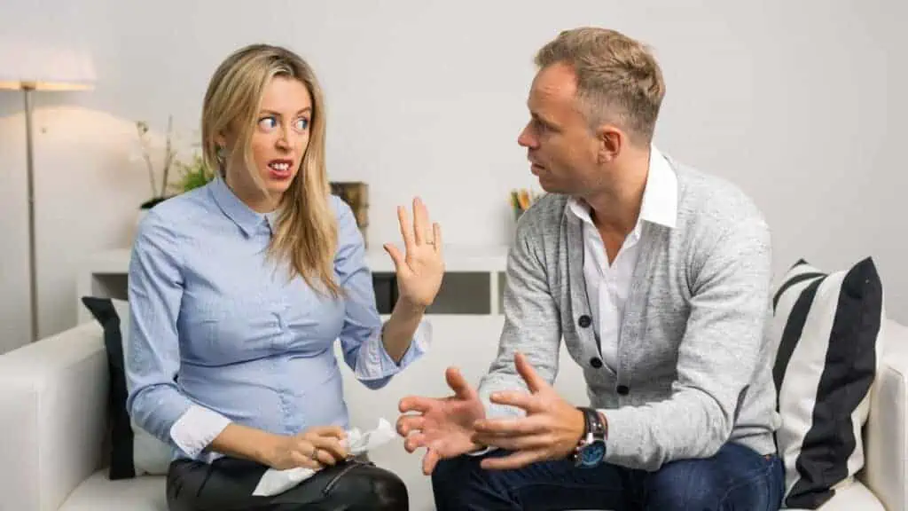 couple arguing, couple fighting on the couch