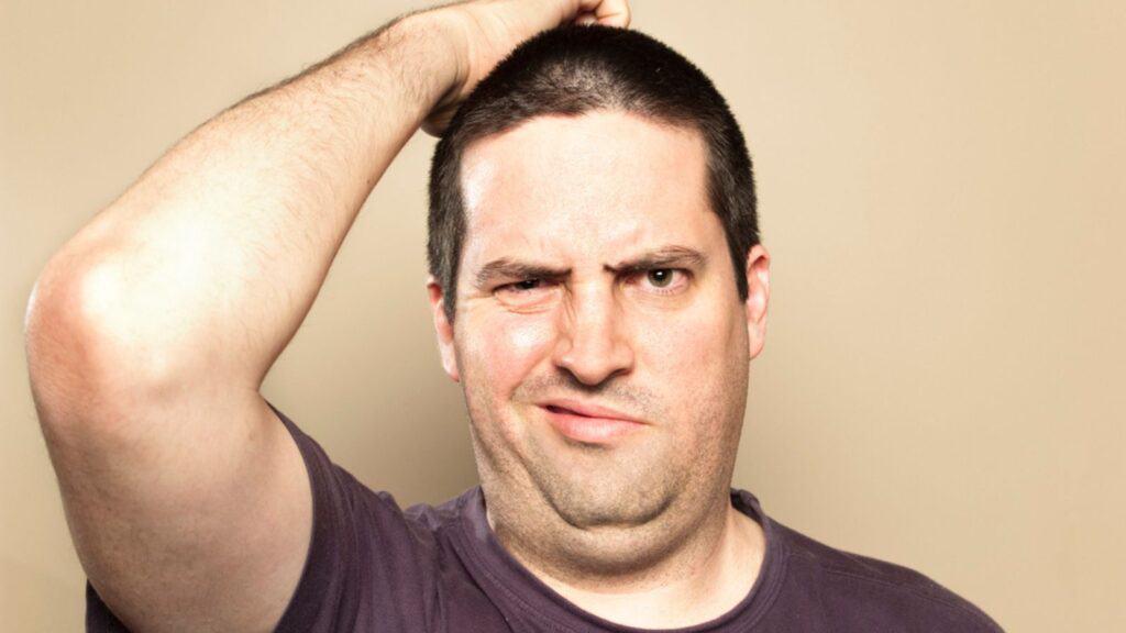 confused man scratching his head