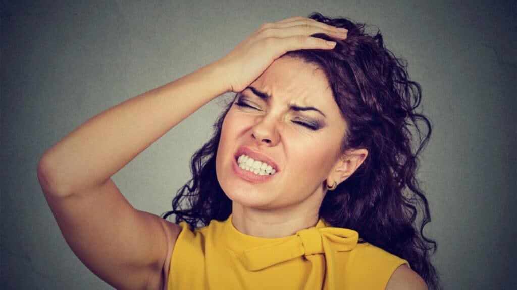 frustrated woman headache mad angry
