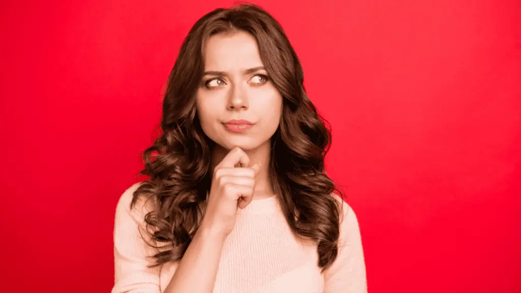 Thinking lady look aside with red background