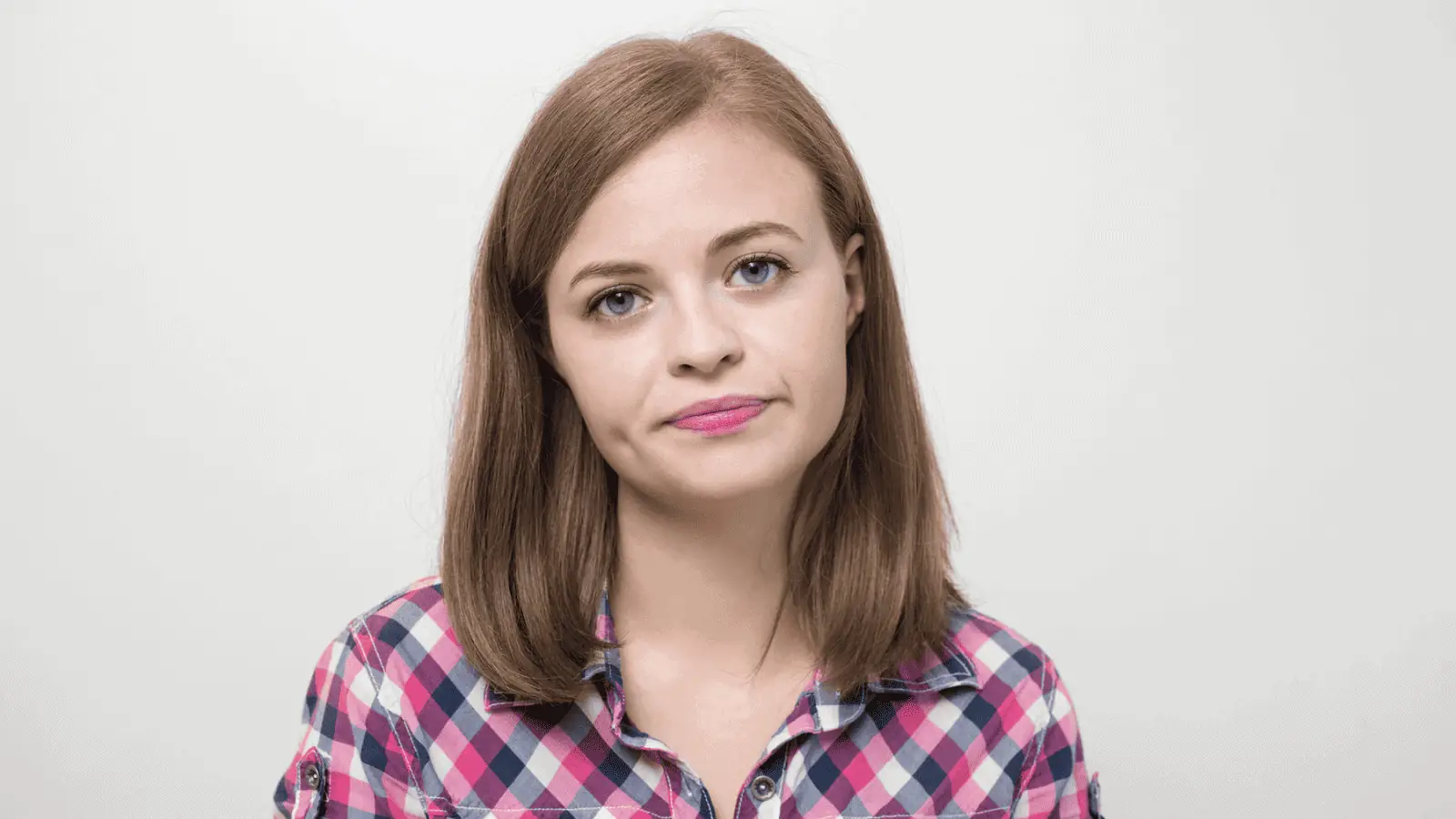 woman rolling her eyes disgusted bored