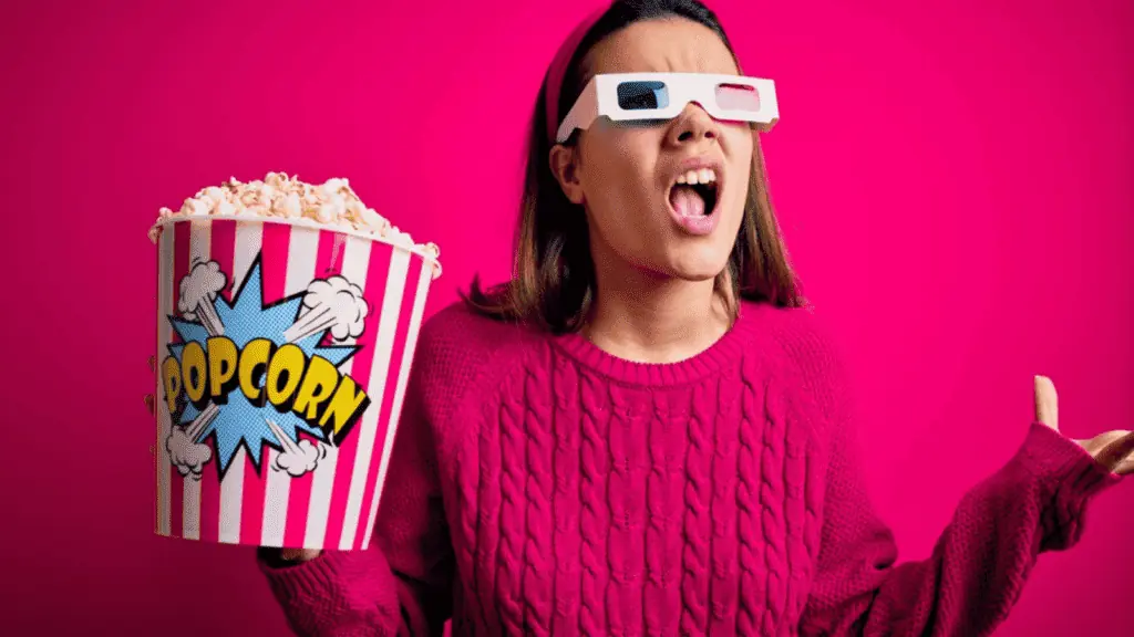 woman annoyed at a movie popcorn 3d mad