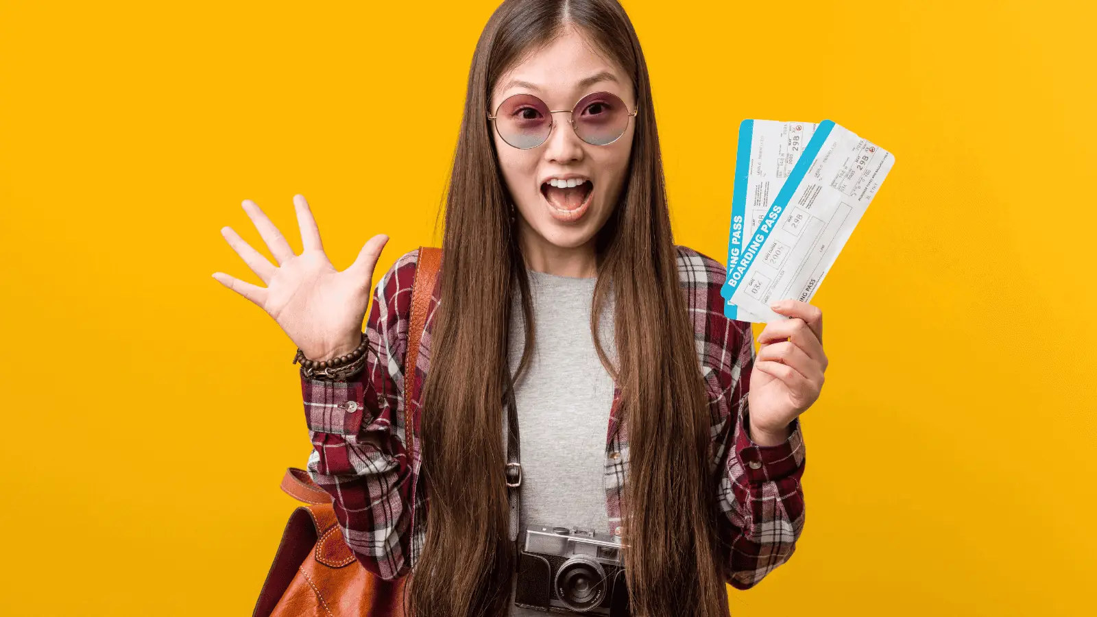 woman excited happy travel flying packed bag airline tickets glasses