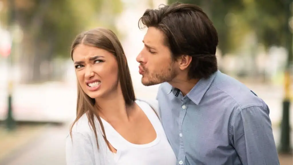 Woman Rejecting To Kiss man On Unsuccessful Date Walking Outside