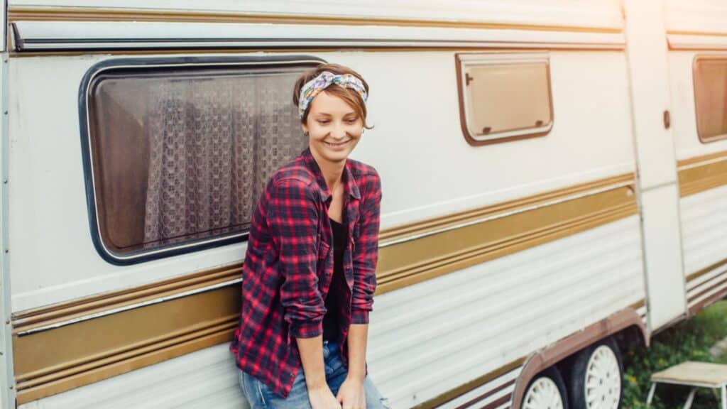 Woman standing near trailer