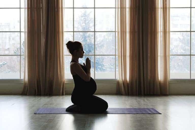 4 Pregnancy Yoga Poses to Ease Back Pain and Stress