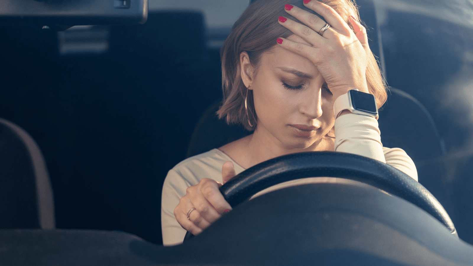 a woman harassed in her car for nursing