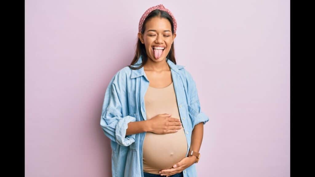 funny laughing pregnant woman