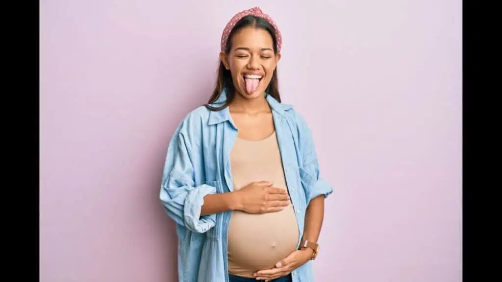 funny laughing pregnant woman