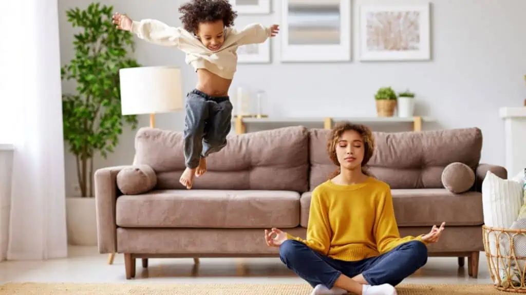 calm mom namaste meditation crazy boy living room