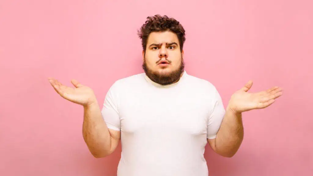 confused overweight man mustache pink