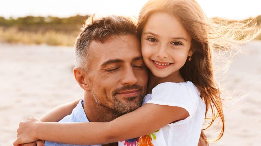 dad and daughter happy hugging love