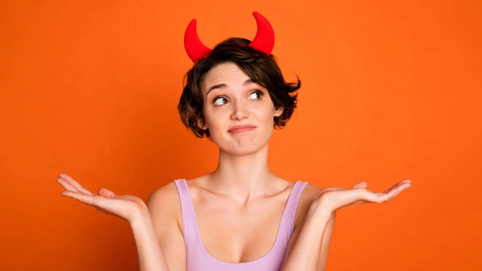 woman dressed up for halloween devil costume