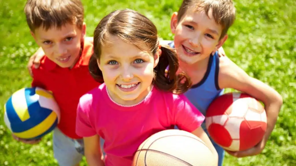 kids playing sports basketball soccer