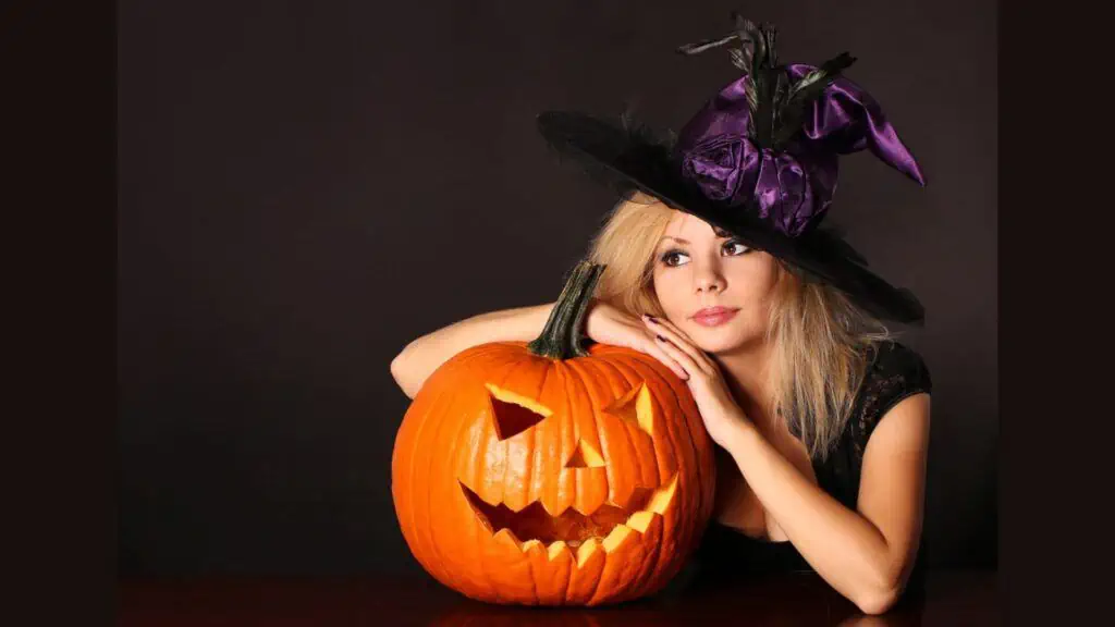 halloween pumpkin witches hat woman