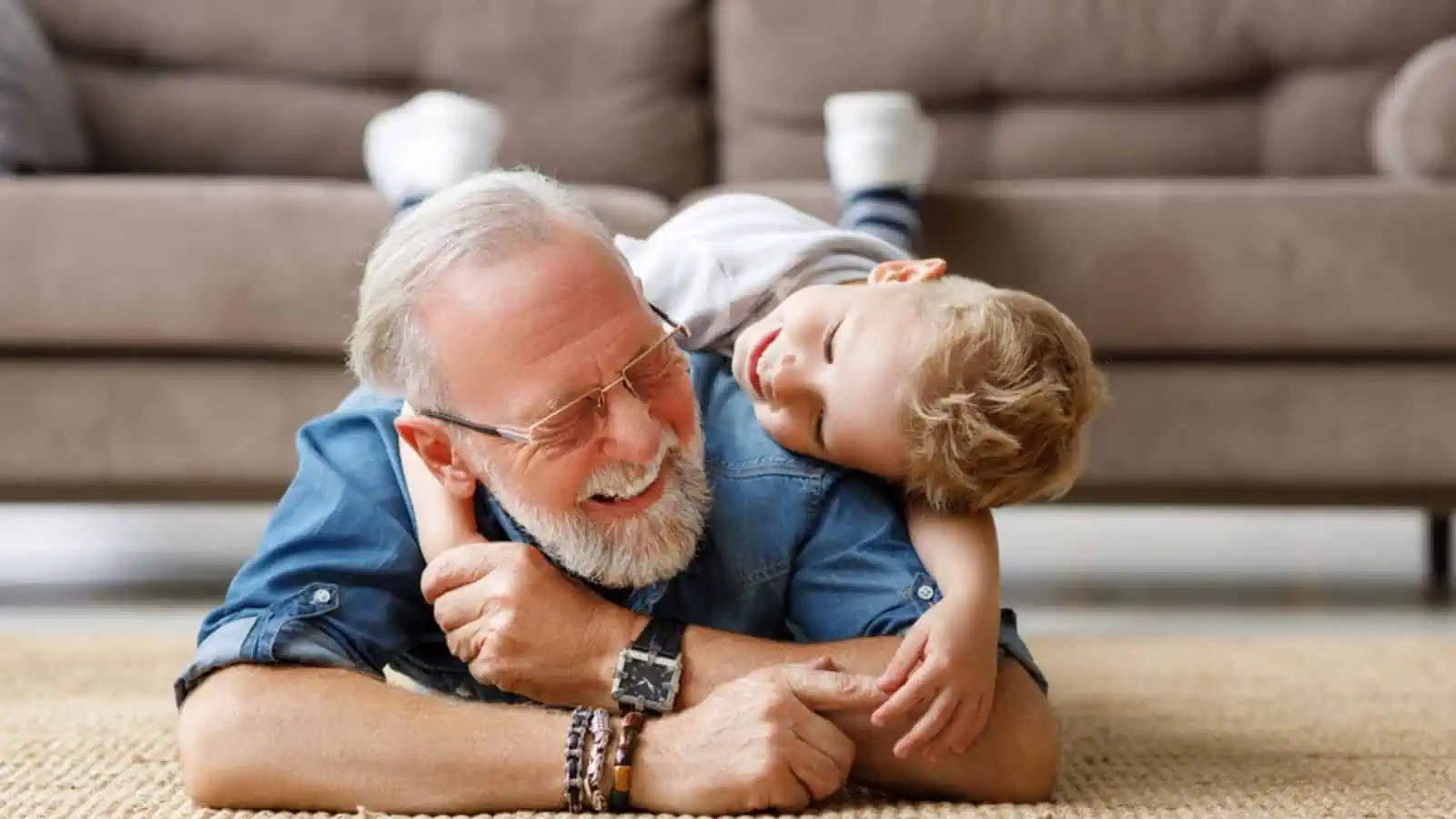 grandpa and grand daughter happy laughing playing