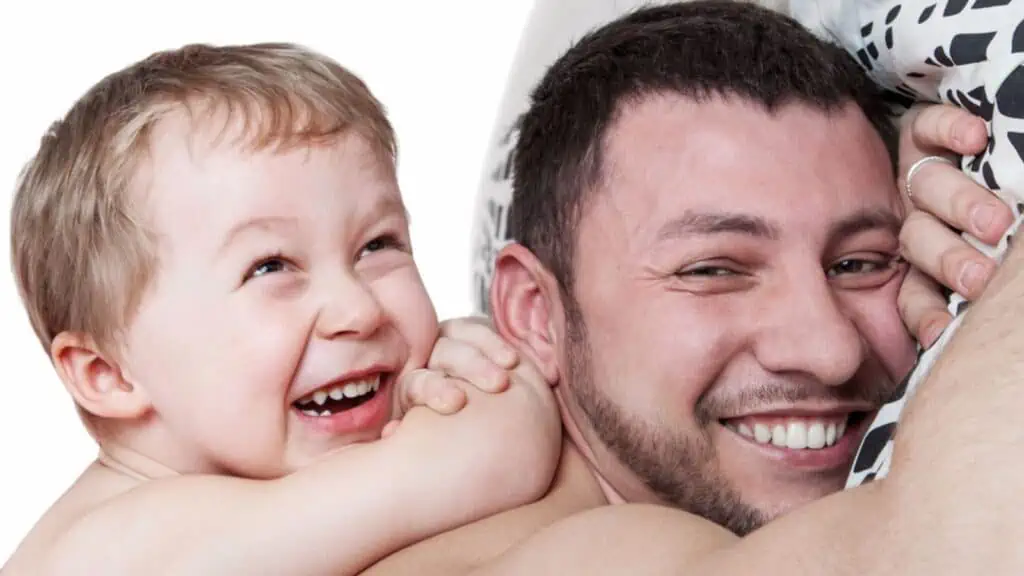 laughing dad and son