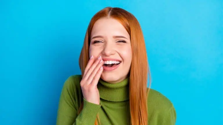 laughing woman on blue background