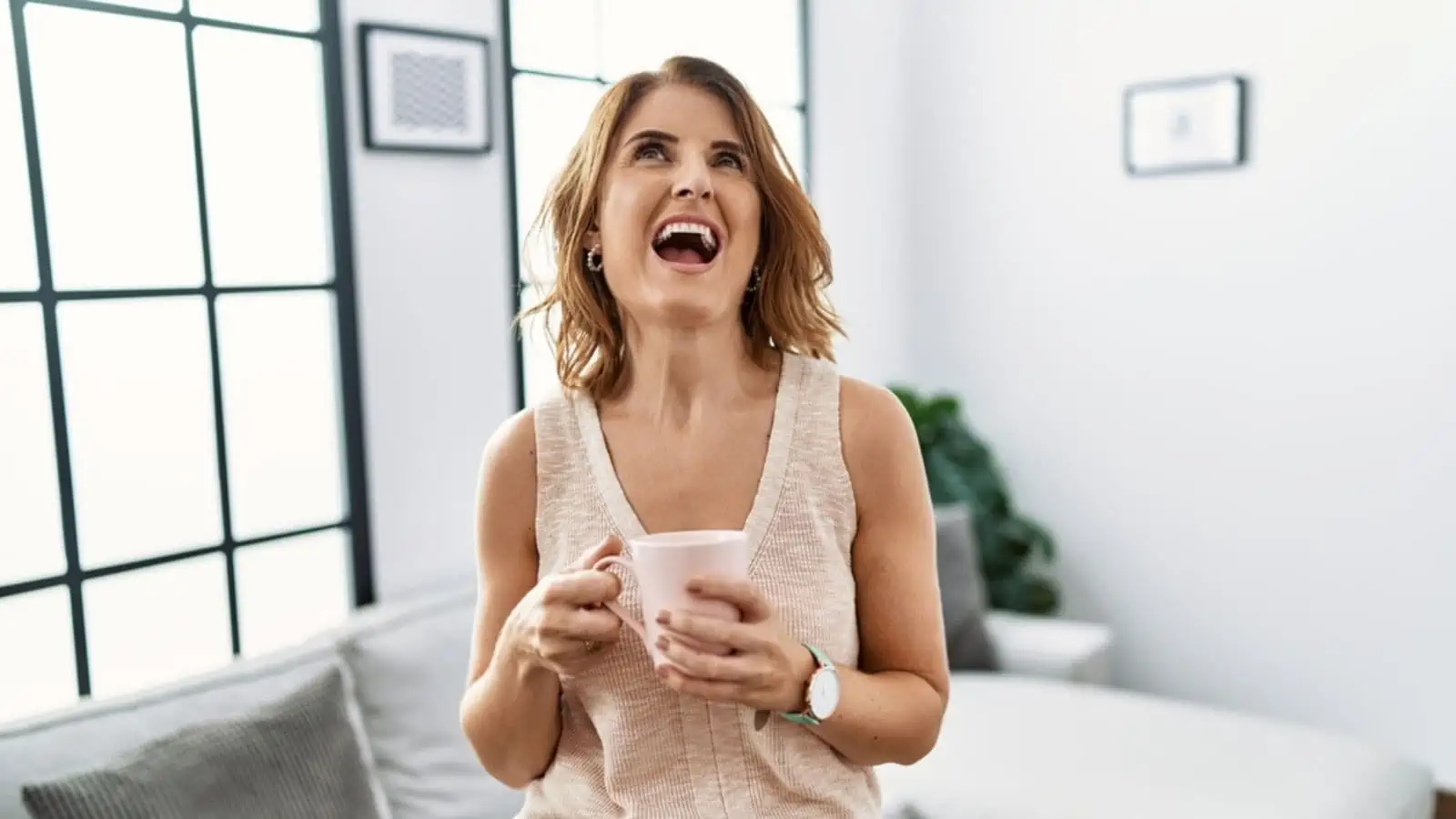woman with angry, mad screaming with evil plan at home
